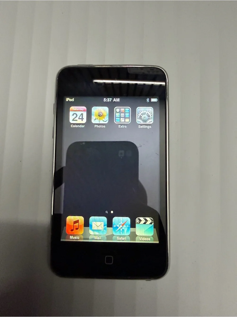 Apple iPod Touch Black with Colorful Orange Wallpaper